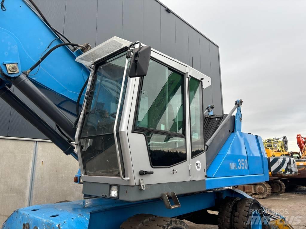 Fuchs MHL350  --  MHL 350 Gravemaskiner for avfallshåndtering