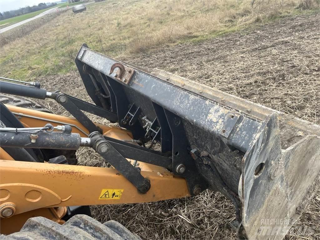 CASE 695 ST Traktorgravere