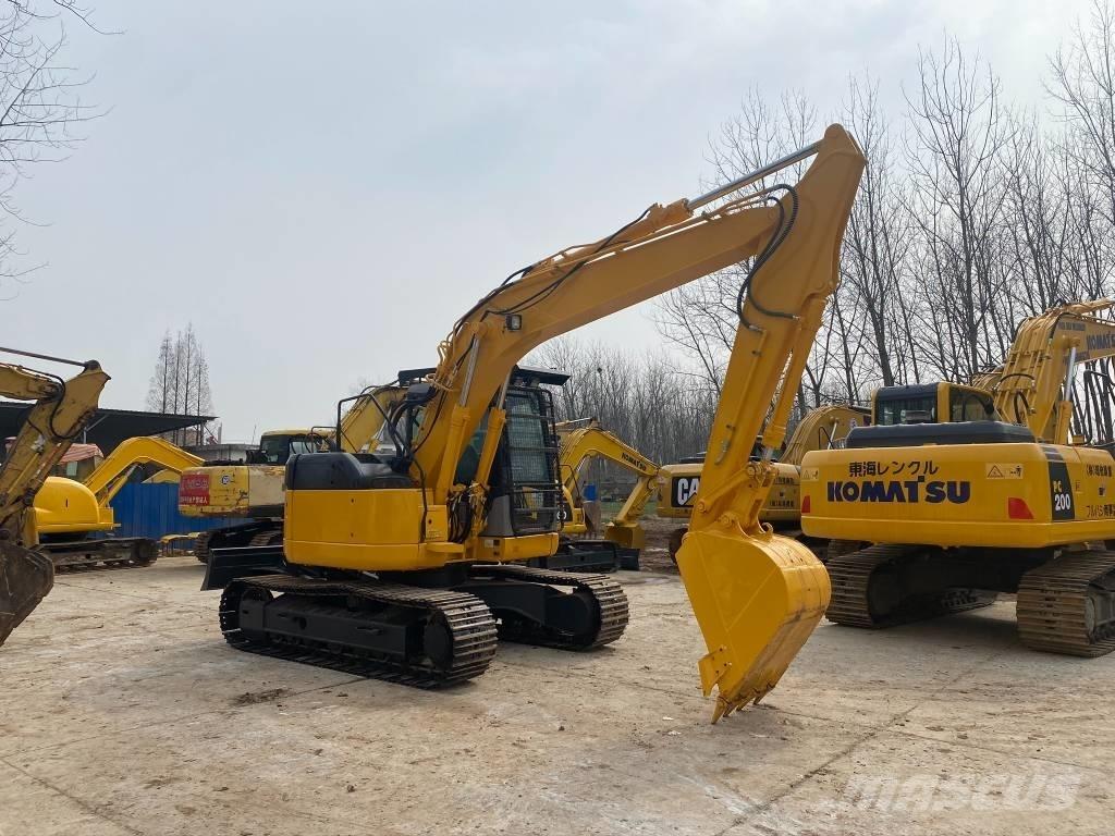 Komatsu PC128US Beltegraver