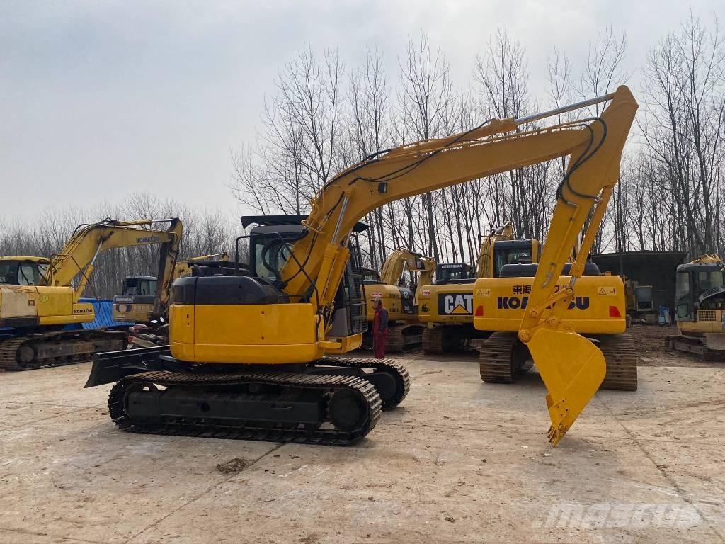 Komatsu PC128US Beltegraver