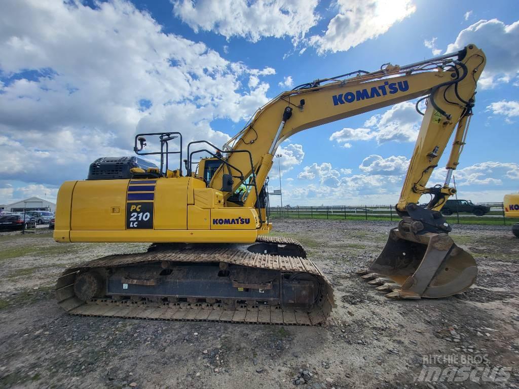 Komatsu PC210-11E0 Beltegraver