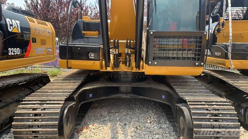 CAT 323 Beltegraver