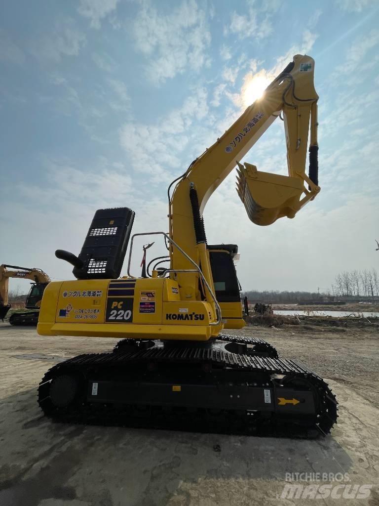Komatsu PC220-8 Beltegraver
