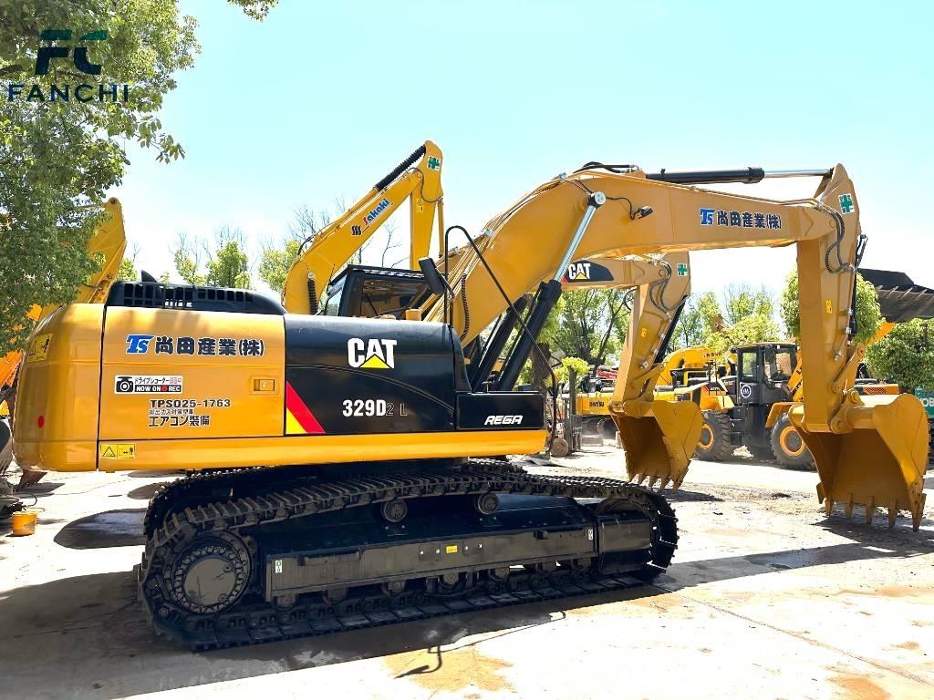 CAT 329 Beltegraver