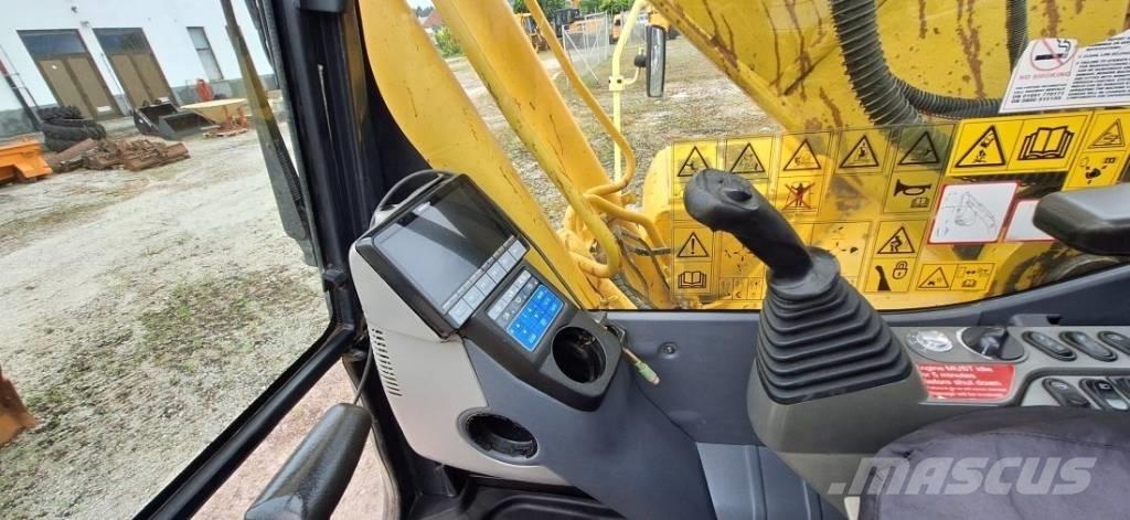 Komatsu PC 210 Beltegraver