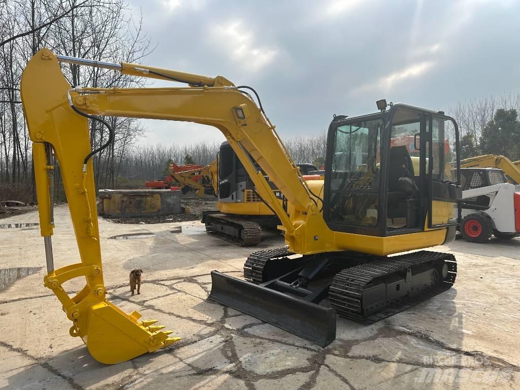 Komatsu PC56 Beltegraver