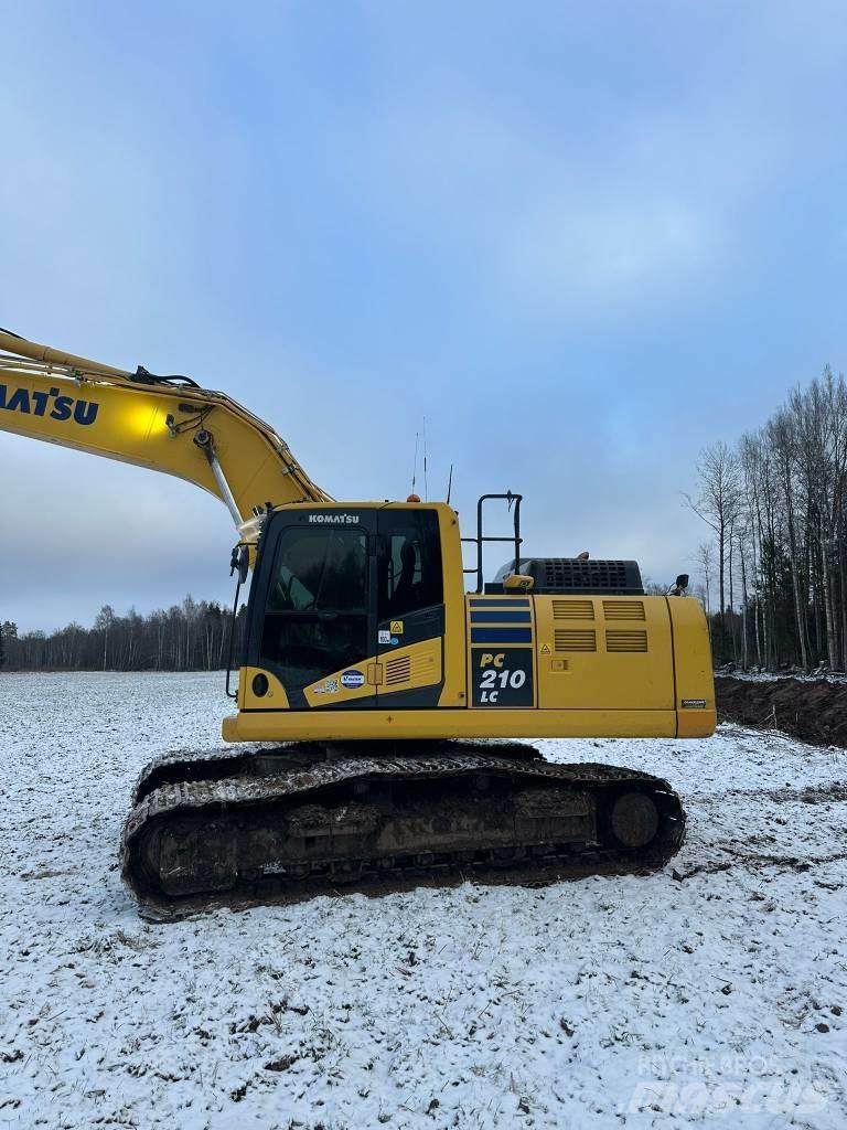 Komatsu PC210LC-11 Beltegraver
