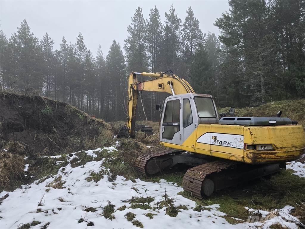 Kobelco SK210LC Beltegraver