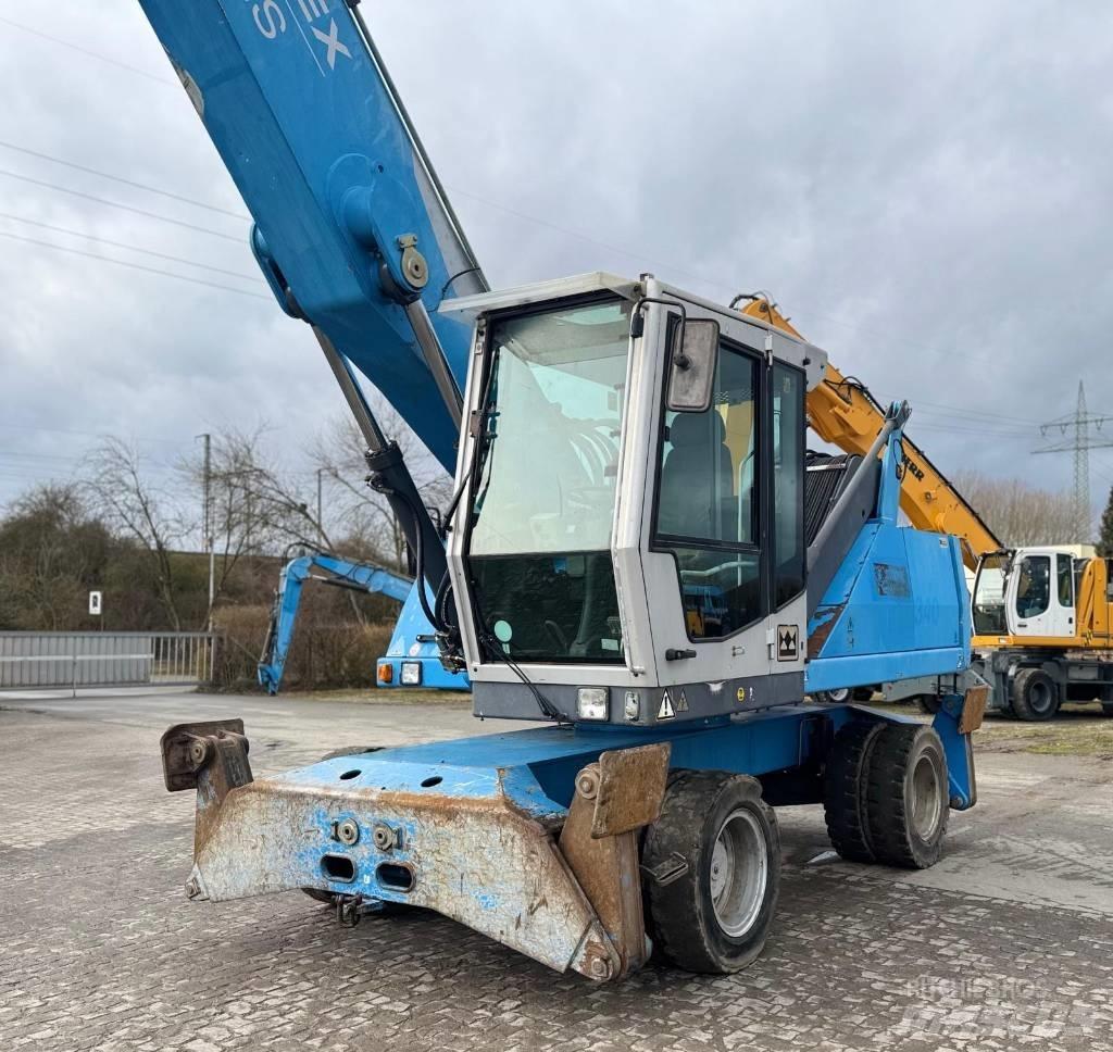 Fuchs MHL 340 Gravemaskiner for avfallshåndtering