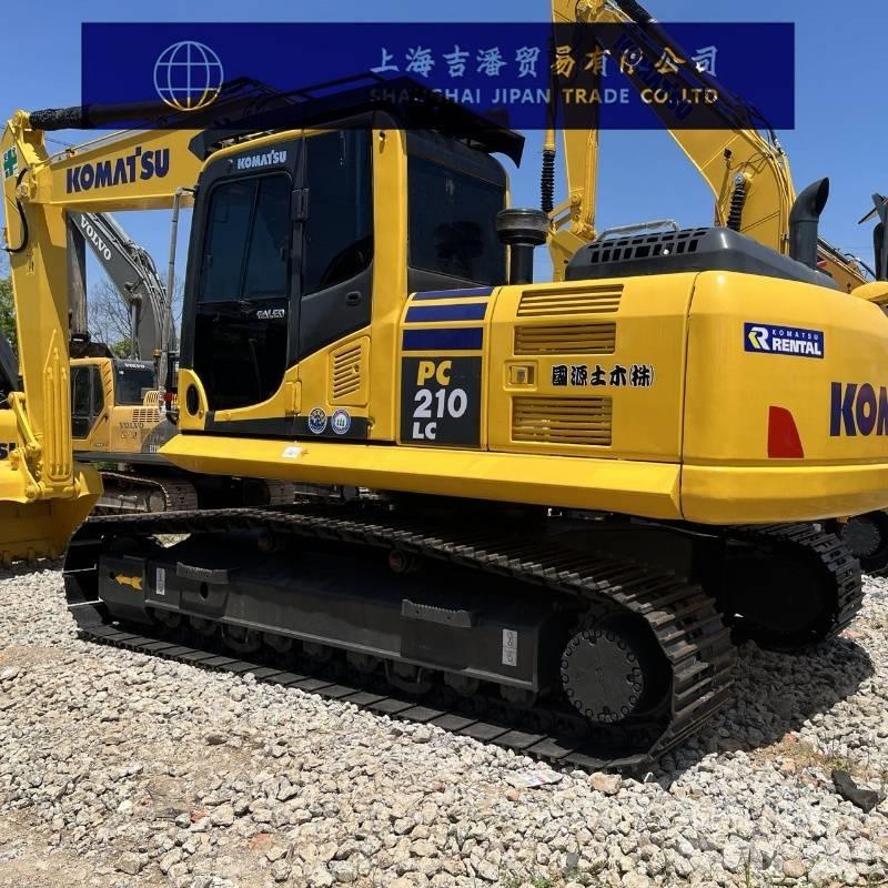 Komatsu PC 210 Beltegraver