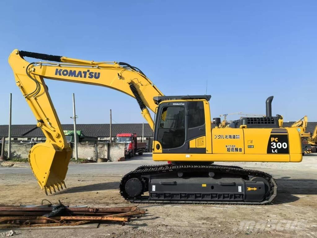 Komatsu PC 300-8 Beltegraver