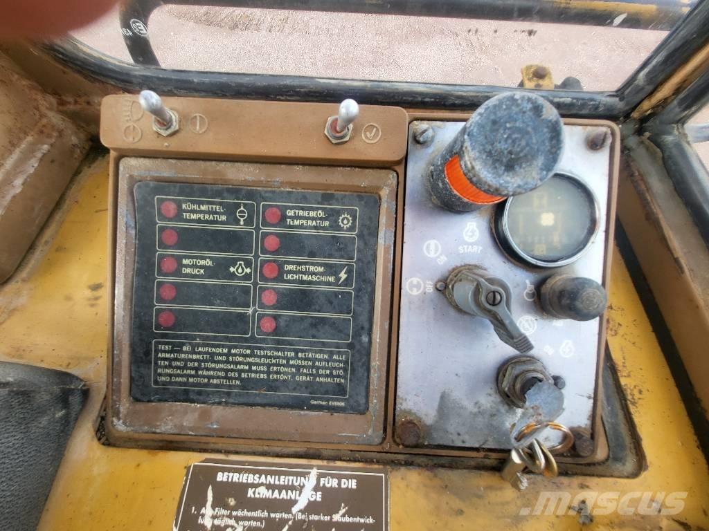 CAT 943 Beltelastere