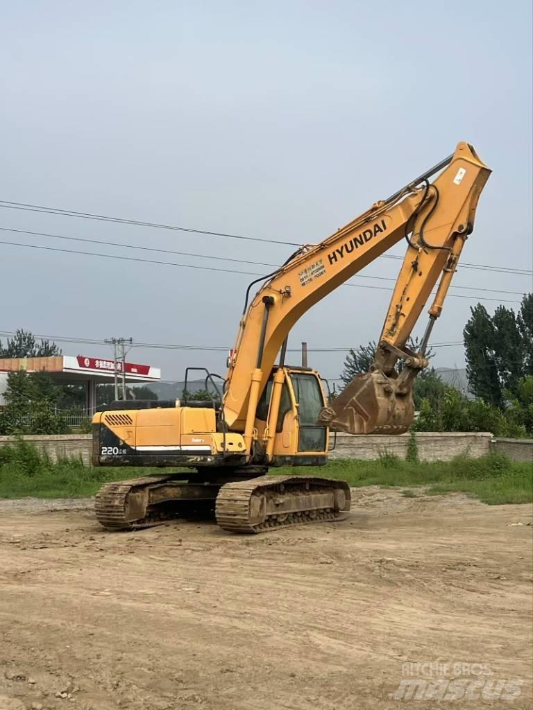 Hyundai R220-9S Beltegraver