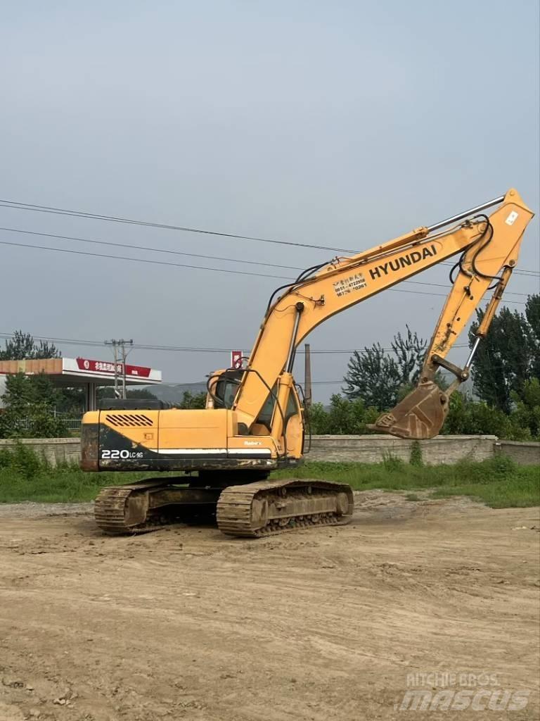 Hyundai R220-9S Beltegraver