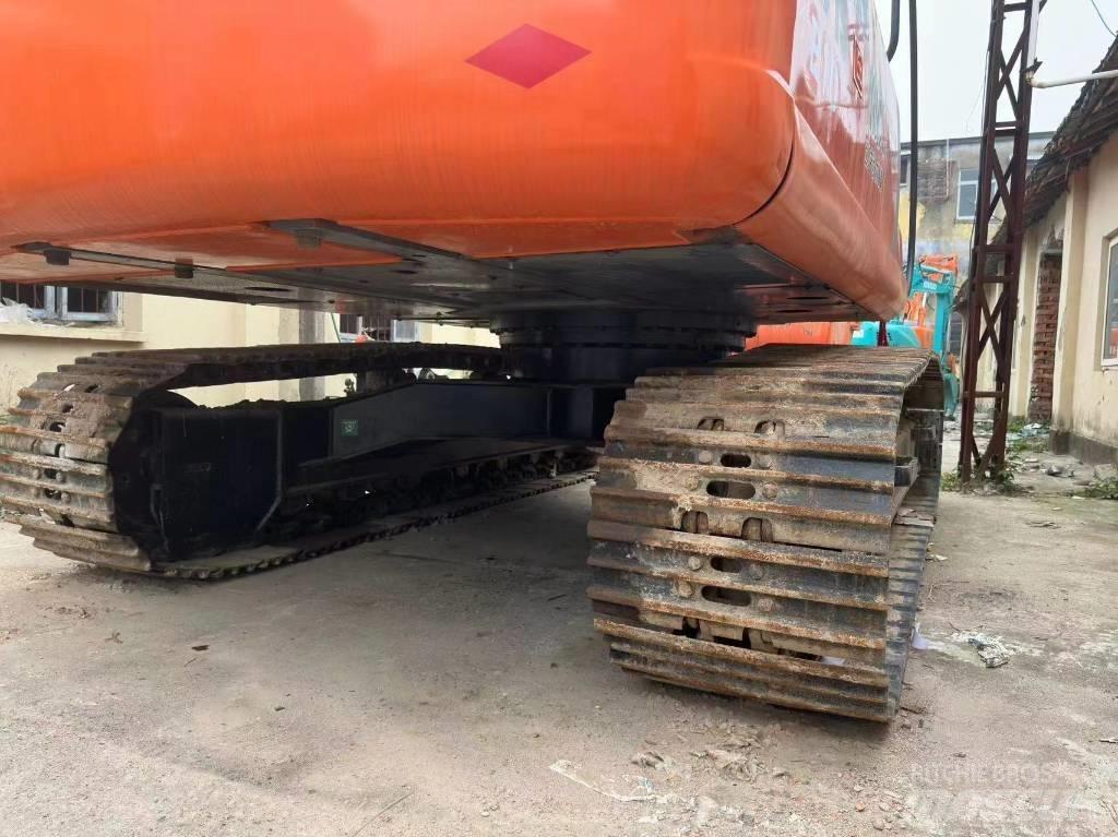 Hitachi ZX 210 Beltegraver