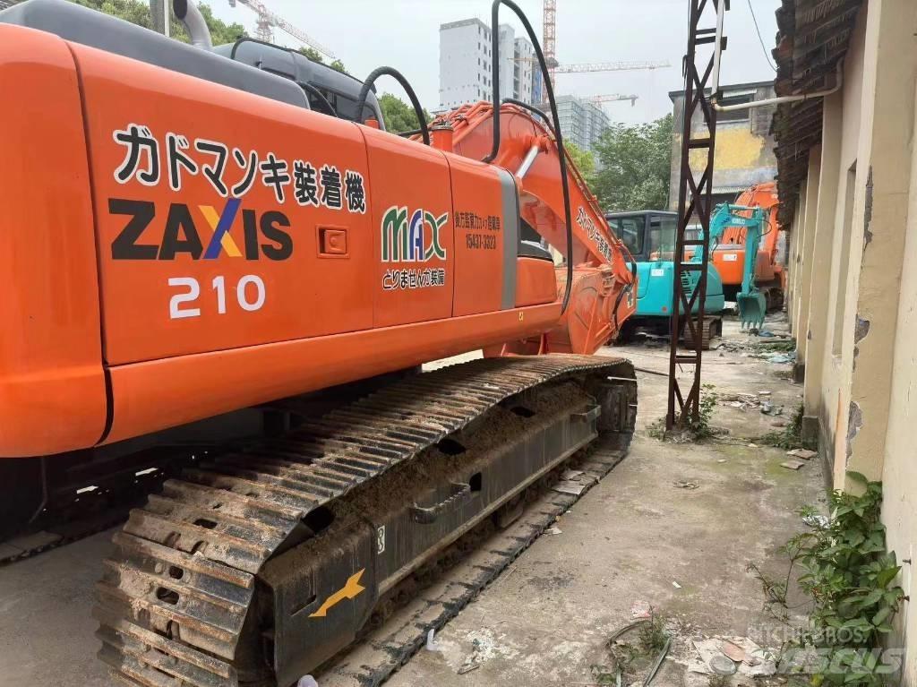Hitachi ZX 210 Beltegraver