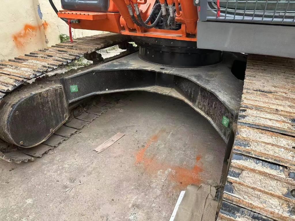 Hitachi ZX 210 Beltegraver
