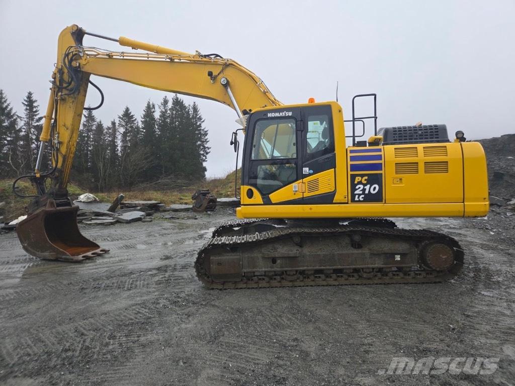 Komatsu PC210LC-11E0 Beltegraver