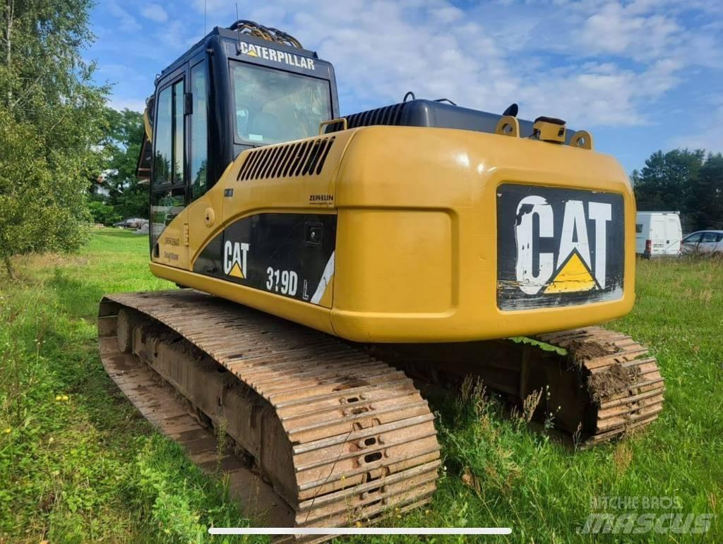CAT 319 Beltegraver