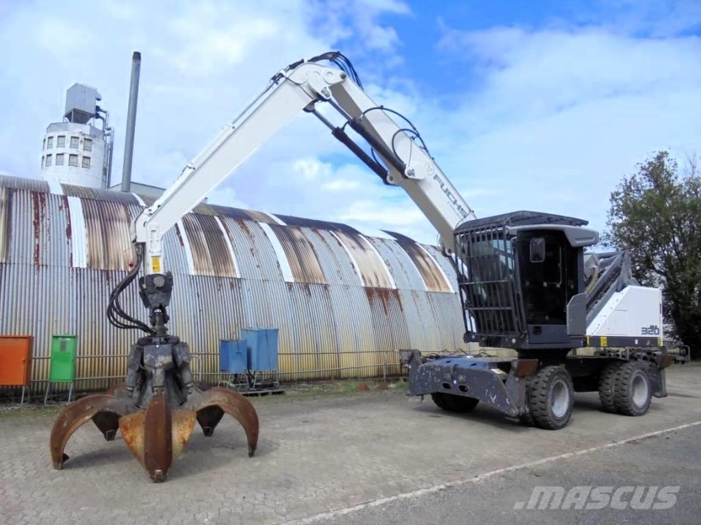 Fuchs MHL 320 Gravemaskiner for avfallshåndtering