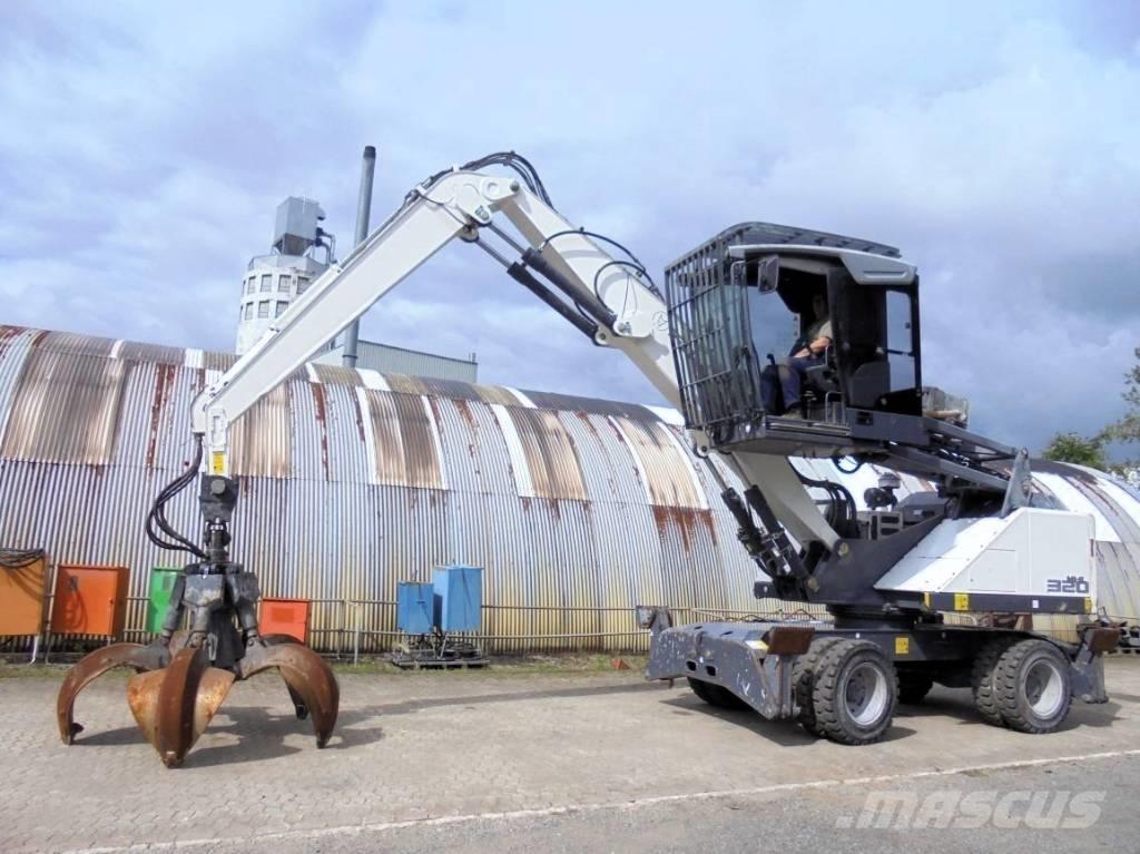 Fuchs MHL 320 Gravemaskiner for avfallshåndtering