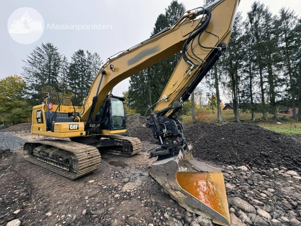 CAT 323 Beltegraver