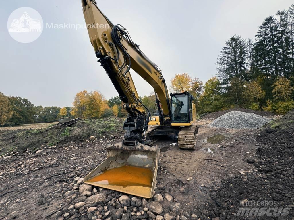 CAT 323 Beltegraver