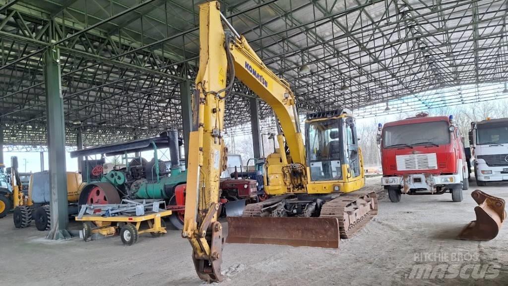 Komatsu 138US-8 Beltegraver