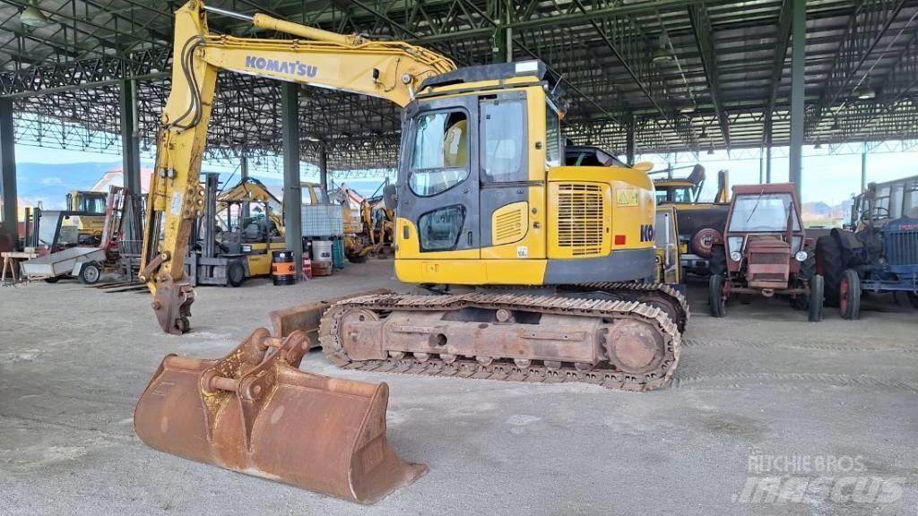 Komatsu 138US-8 Beltegraver