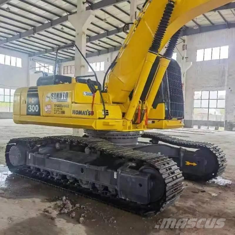 Komatsu PC300-7 Beltegraver