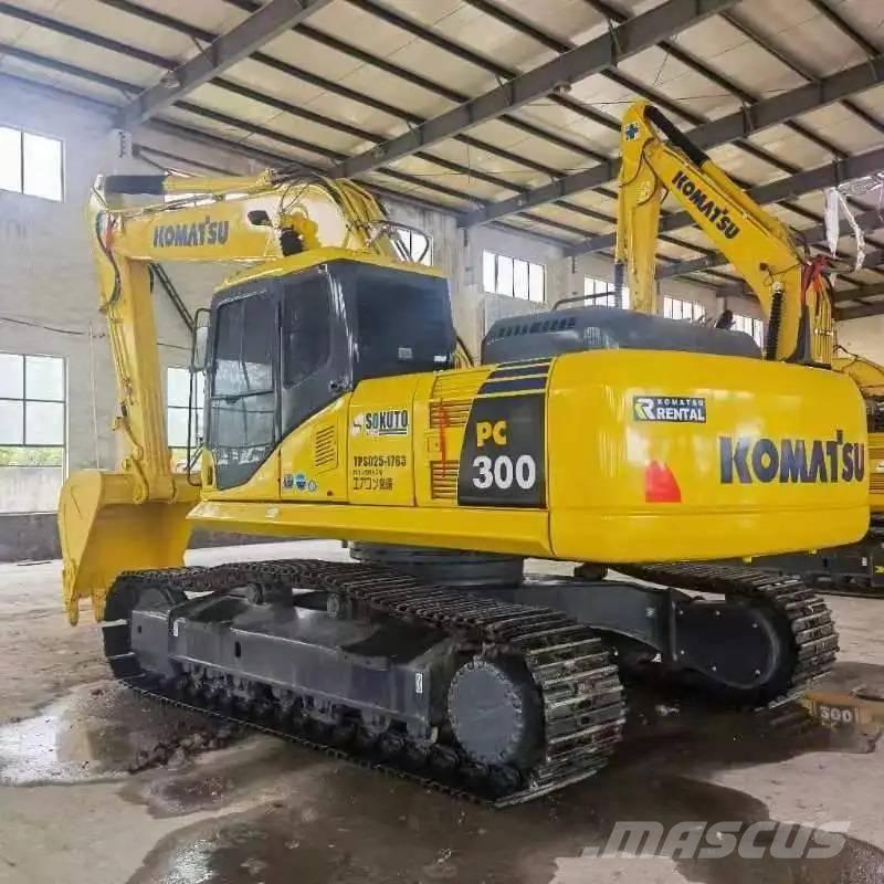 Komatsu PC300-7 Beltegraver