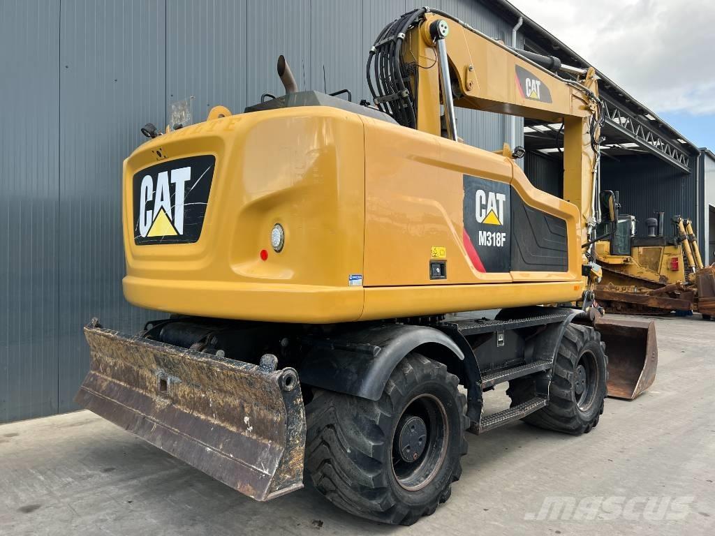 CAT M318F Hjulgravere