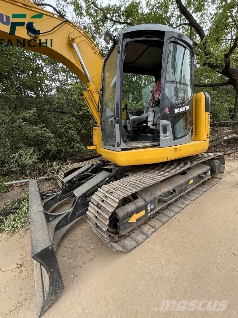 Komatsu PC128US Beltegraver