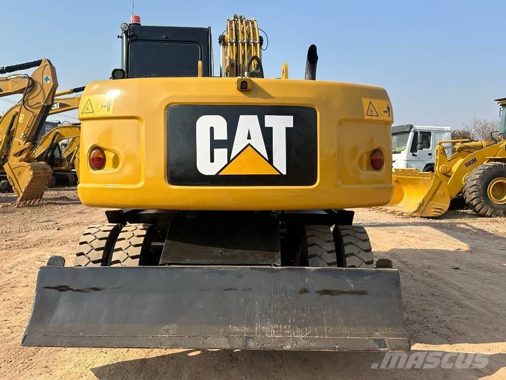 CAT M 320D Hjulgravere