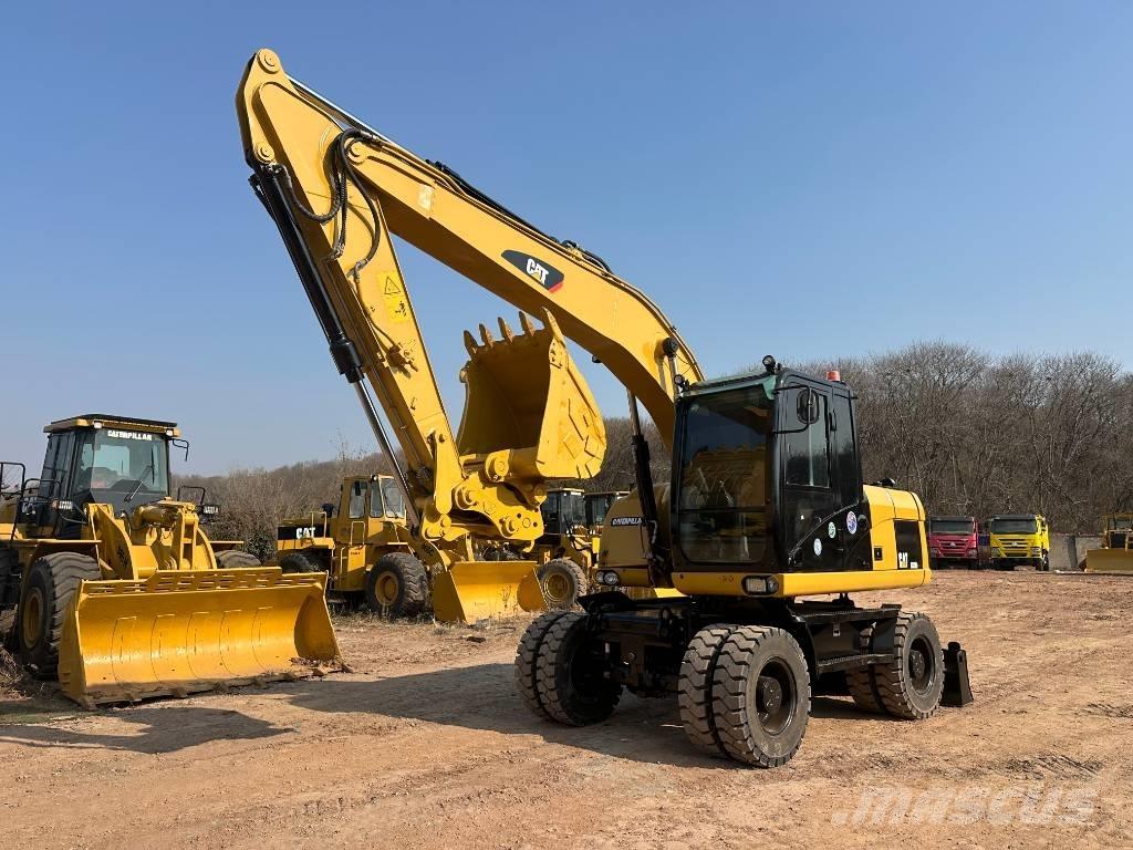 CAT M 320D Hjulgravere