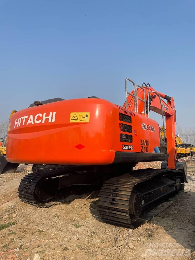 Hitachi 210LC Beltegraver