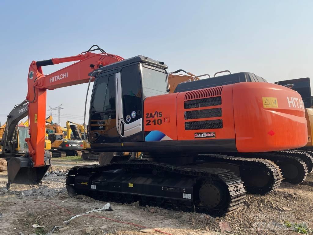 Hitachi 210LC Beltegraver