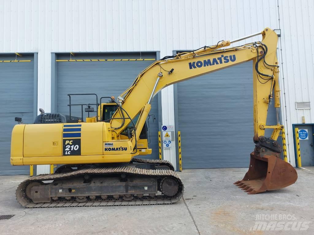 Komatsu PC210LC-10 Beltegraver