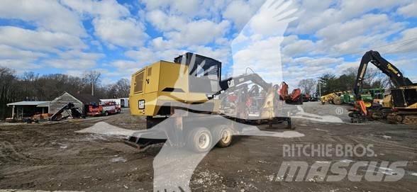 CAT 559C Knuckleboom lastere