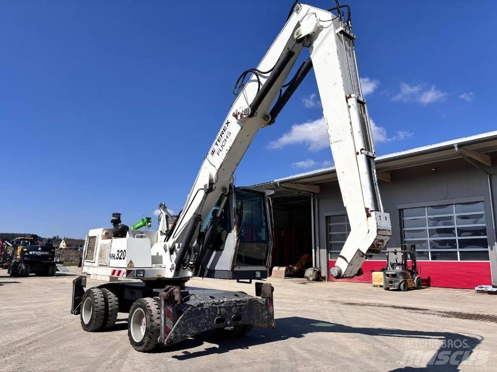 Fuchs MHL 320 Gravemaskiner for avfallshåndtering