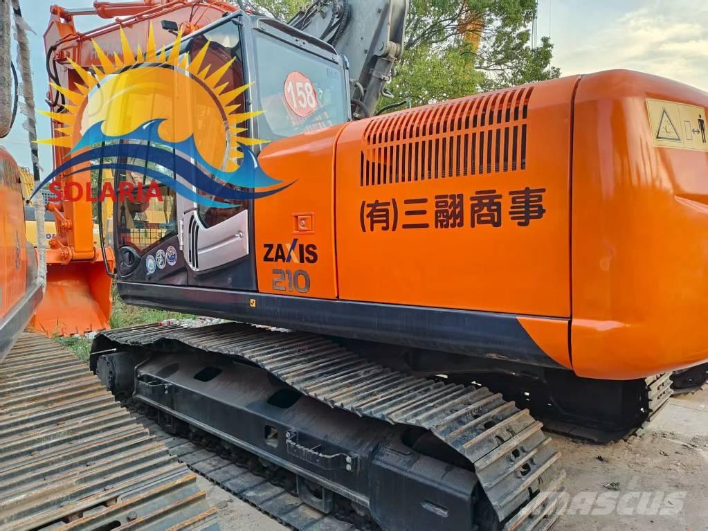 Hitachi ZX 210 Beltegraver