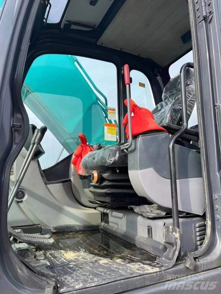 Kobelco SK210 Beltegraver