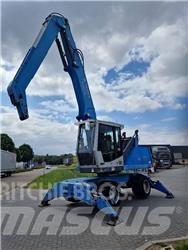 Fuchs MHL 331 Gravemaskiner for avfallshåndtering