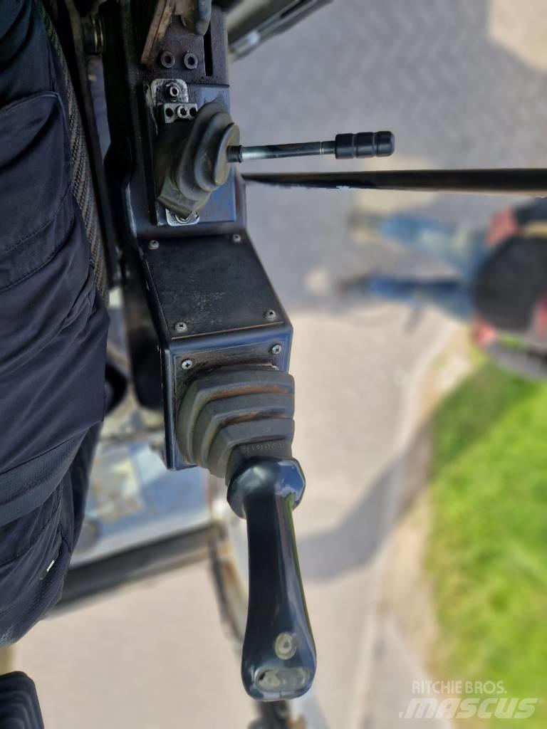 Fuchs MHL 331 Gravemaskiner for avfallshåndtering