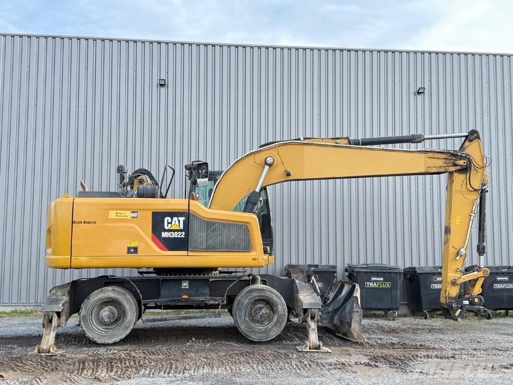 CAT MH3022 Gravemaskiner for avfallshåndtering