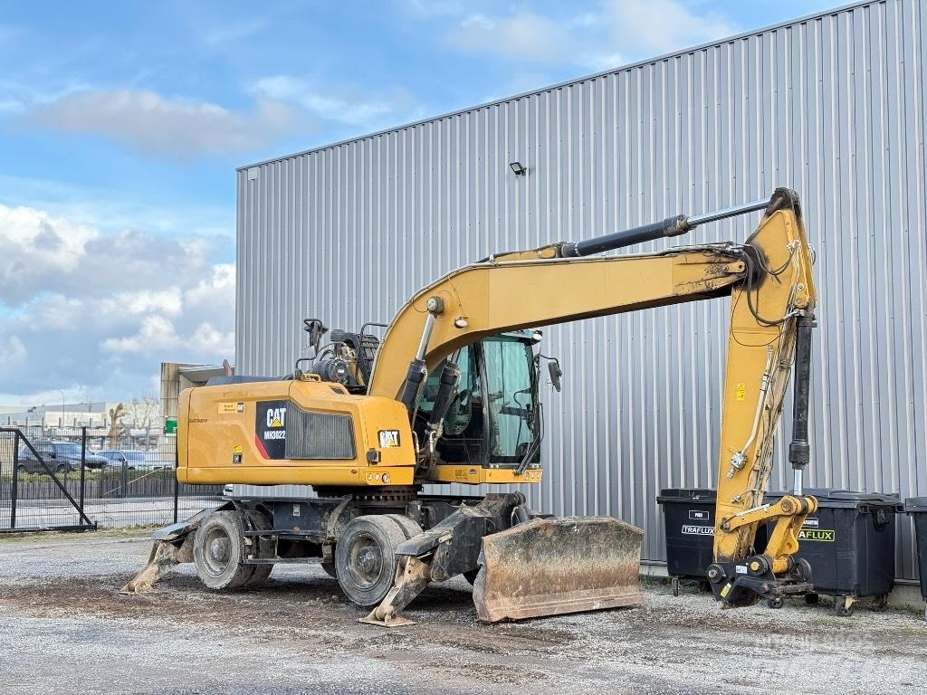 CAT MH3022 Gravemaskiner for avfallshåndtering