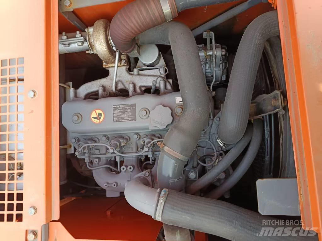 Hitachi ZX135 Beltegraver