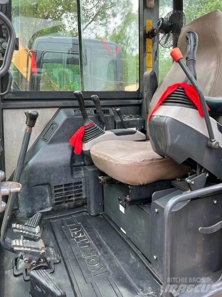 Komatsu PC56-7 Beltegraver