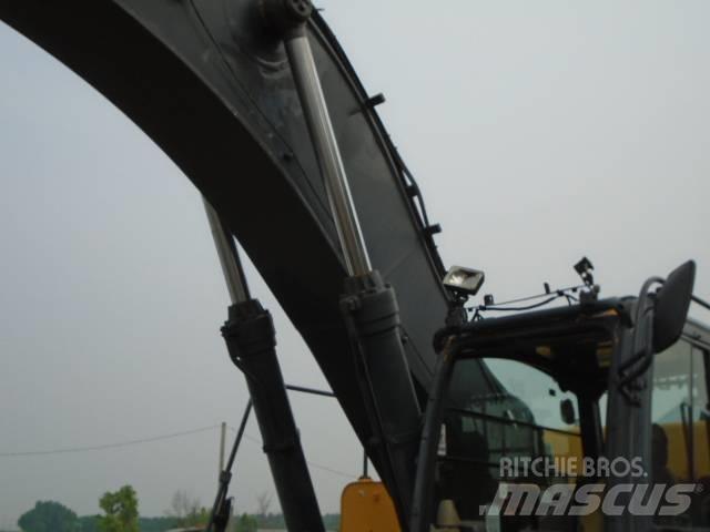 John Deere 450 DLC Beltegraver
