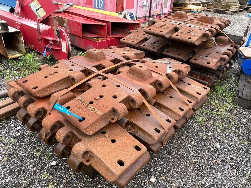 Manitowoc  Belter, kjettinger og understell